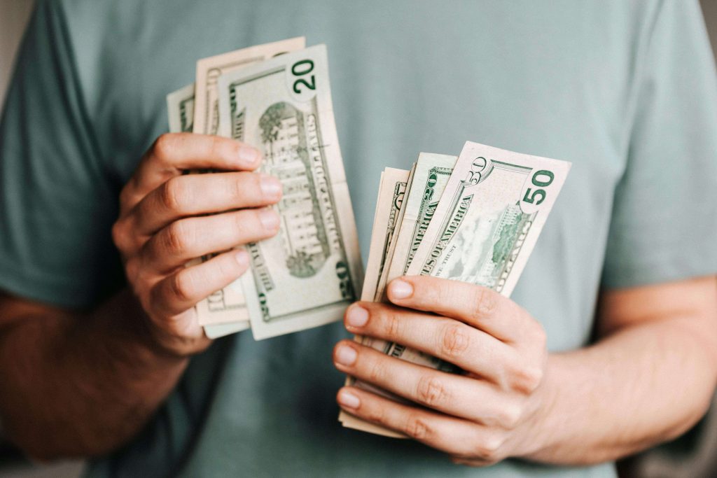 Person applying online for a fast cash loan until payday.